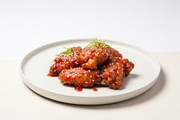 Korean fried chicken with juicy sauce plate food meat.