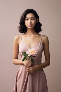 Wearing pink dress with flower portrait adult plant.