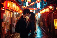 Photo of Japanese teenager couple kissing street alley adult.