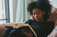 Mixed race woman reading book person adult contemplation.