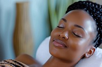 Black South African woman adult skin relaxation.