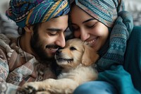 Middle eastern gay couple kiss their puppy portrait smiling blanket.