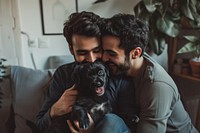 Middle eastern gay couple kiss their puppy smiling mammal animal.