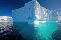 Iceberg with blue ocean outdoors nature climate change.