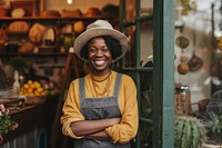 Cheerful small business owner standing smiling adult.