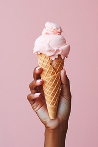 Hand holding ice cream dessert food freshness.