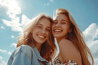 Lovable caucasian women laughing outdoors smile.