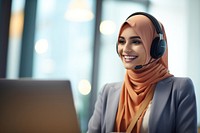 Muslim woman working at call center laptop computer adult.