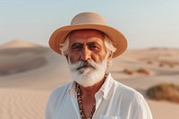 Senior indian man portrait outdoors desert.