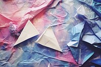 Abstract iridescent airplane ripped paper marble effect art origami backgrounds.