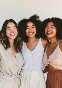 3 happy women laughing blouse person.