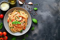 Chicken parmesan pasta spaghetti plate food.