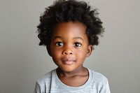 Adorable African American little boy portrait child studio shot.