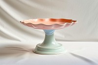 One piece of pastel ceramic pedestal cake plate birdbath porcelain festival.