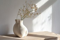 Minimal freeform handmade ceramic empty vase on wooden table furniture pottery flower.