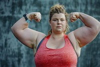 Fat white woman flexing muscle sports adult flexing muscles.