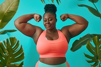 Fat black woman flexing muscle pose portrait sports adult.