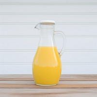 Honey mustard dressing in transparent glass jug drink juice milk.
