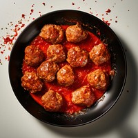 Juicy italian style meatballs food vegetable condiment.