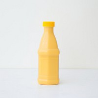 Mustard sauce plastic squeeze bottle drink juice white background.