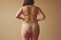 Chubby woman back skin underwear lingerie panties.