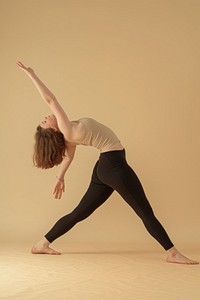 Studio photo focus of chubby woman doing stretch yoga sports adult concentration.
