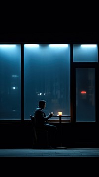  A man smoking in the night bar silhouette lighting sitting. AI generated Image by rawpixel.