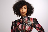 Black woman wearing fashionable floral blouse portrait adult photo. AI generated Image by rawpixel.