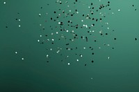  Sage green background with falling confetti backgrounds paper fireworks. AI generated Image by rawpixel.