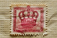 Vintage postage stamp with crown paper blackboard currency.