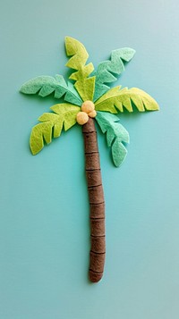 Wallpaper of felt palm tree plant green leaf.