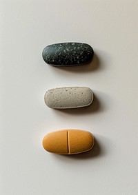 Medicine pebble pill white background.
