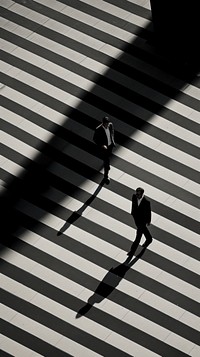 People walking at crossroad silhouette monochrome light.