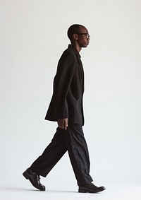 African american overcoat standing walking.