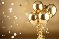 Photo of a foil balloons confetti gold illuminated.
