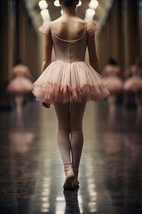 Ballet girls legs standing in ballet shoes dancing adult entertainment.