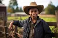 Black kid farmers portrait outdoors smiling.