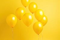 Yellow balloons backgrounds celebration anniversary.
