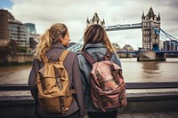Mixed race friends travel london backpack bridge adult.