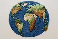 Earth in embroidery style pattern accessories creativity.