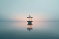 Minimal Chinese lamp on water outdoors horizon nature.