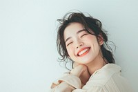 Cheerful korean woman laughing portrait smile.
