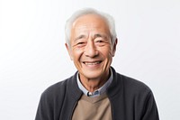 Senior man sitting and smile portrait adult white background.
