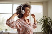 Woman in her 50s headphones adult electronics.