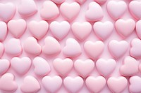 Pastel pink heart candies confectionery backgrounds dessert. AI generated Image by rawpixel.