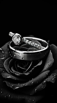 Photography of couple ring monochrome diamond jewelry.