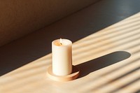 Candle package mockup shadow light table.