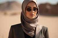 Middle East gorgeous businesswoman sunglasses portrait standing.