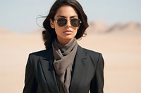 Middle East gorgeous businesswoman sunglasses standing portrait.