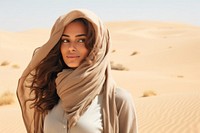 Middle East joyful woman desert portrait outdoors.